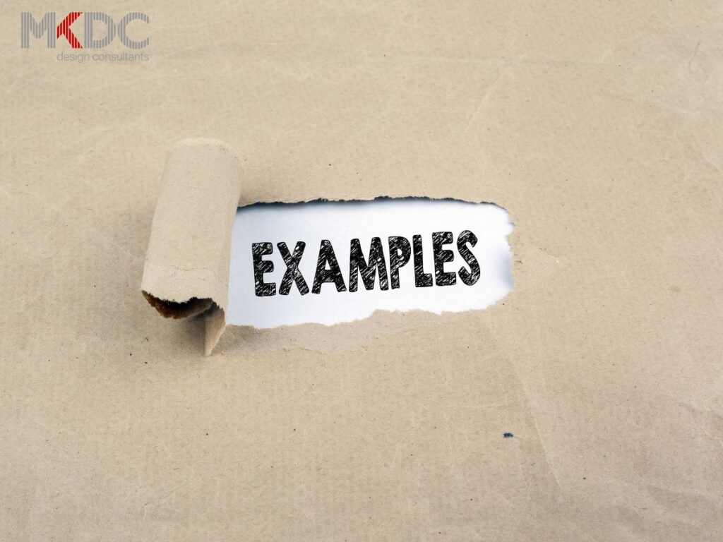 A torn section of brown paper exposing the word "Examples" underneath.
